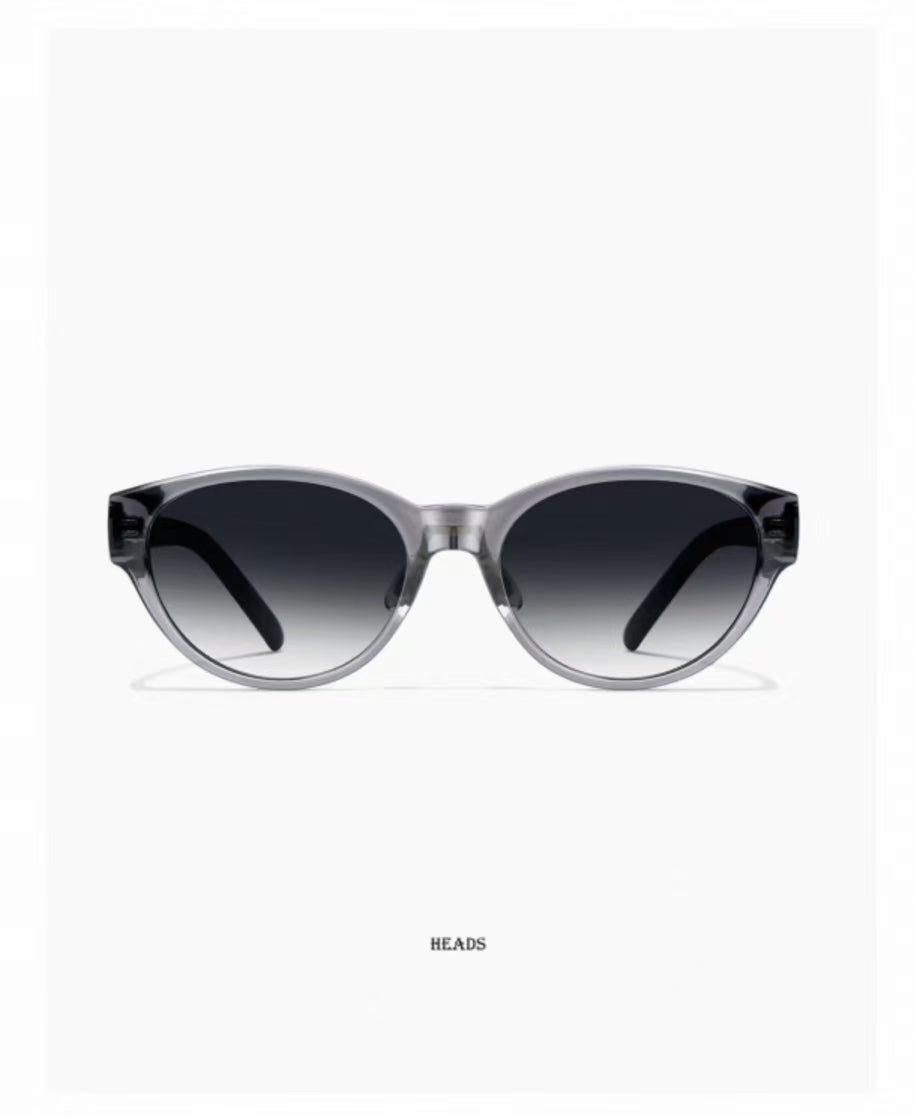 Women’s Gray full-rim cat-eye sunglasses, front and three-quarter views