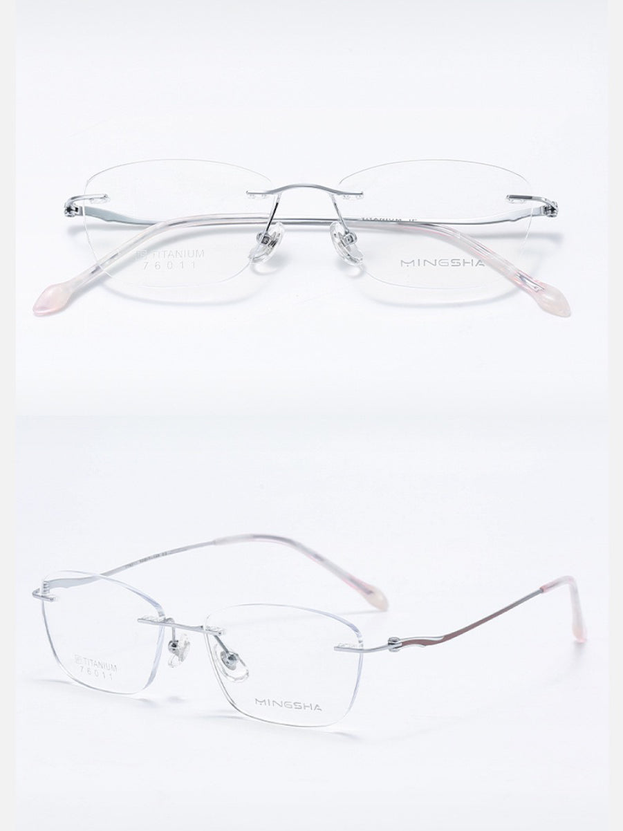 Silver unisex semi-titanium rounded-rectangle rimless eyeglass frames, product views
