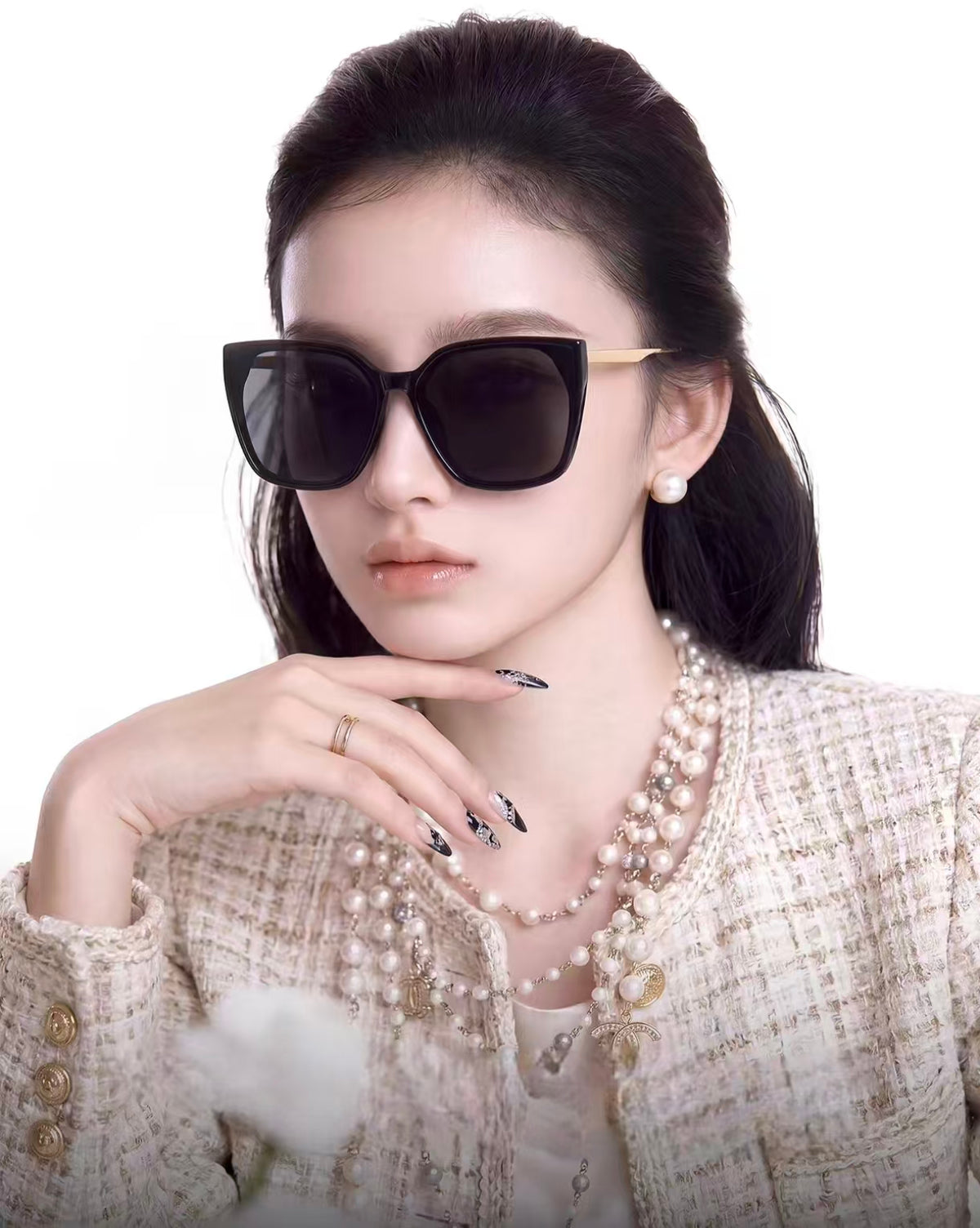 Woman wearing black full-rim oversized square tr90 sunglasses, front portrait