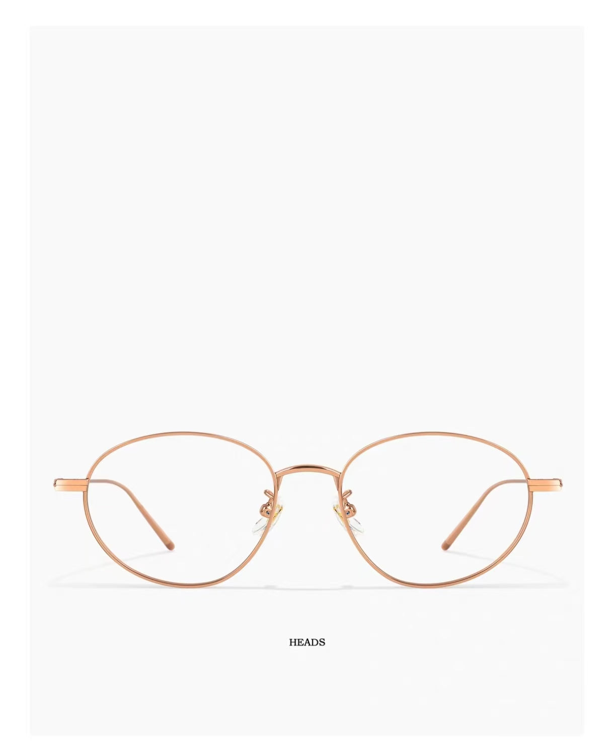 Rose Gold women's semi-titanium oval full-rim glasses, front product view