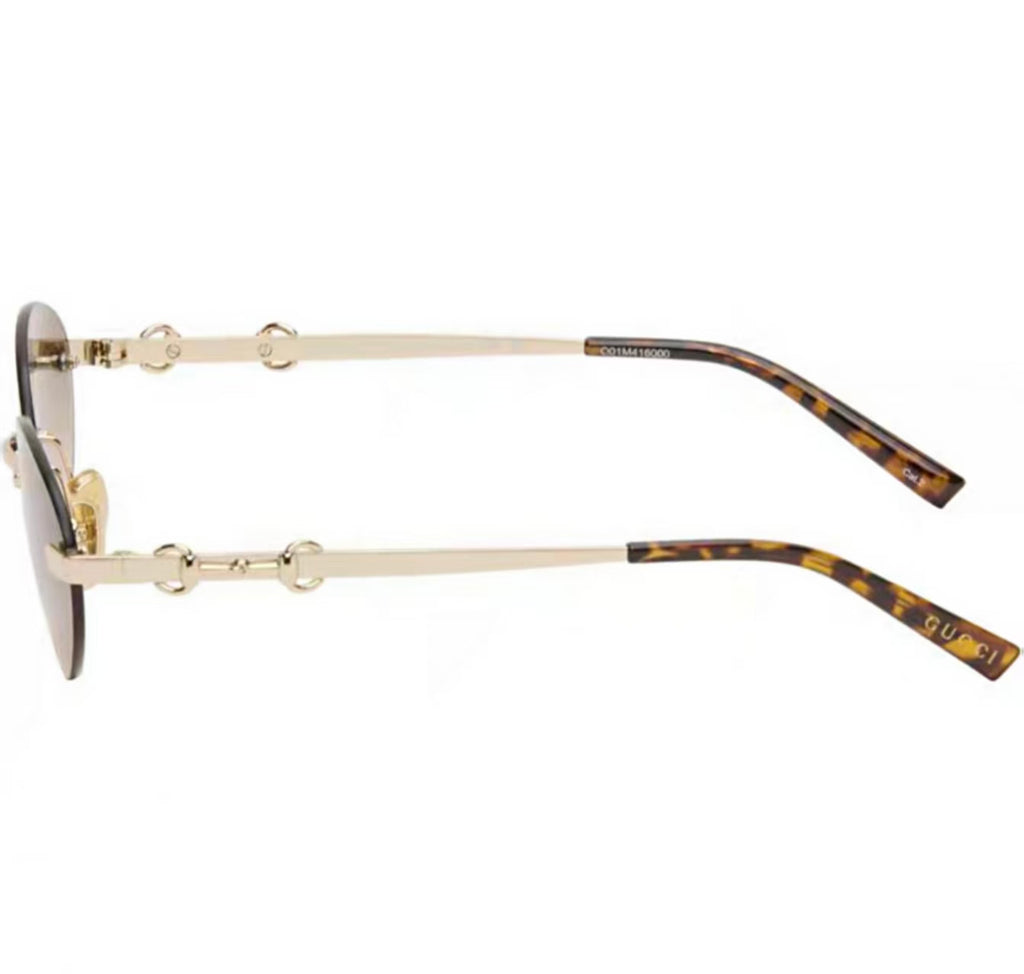 Gold left side product view of Gucci Frameless oval sunglasses