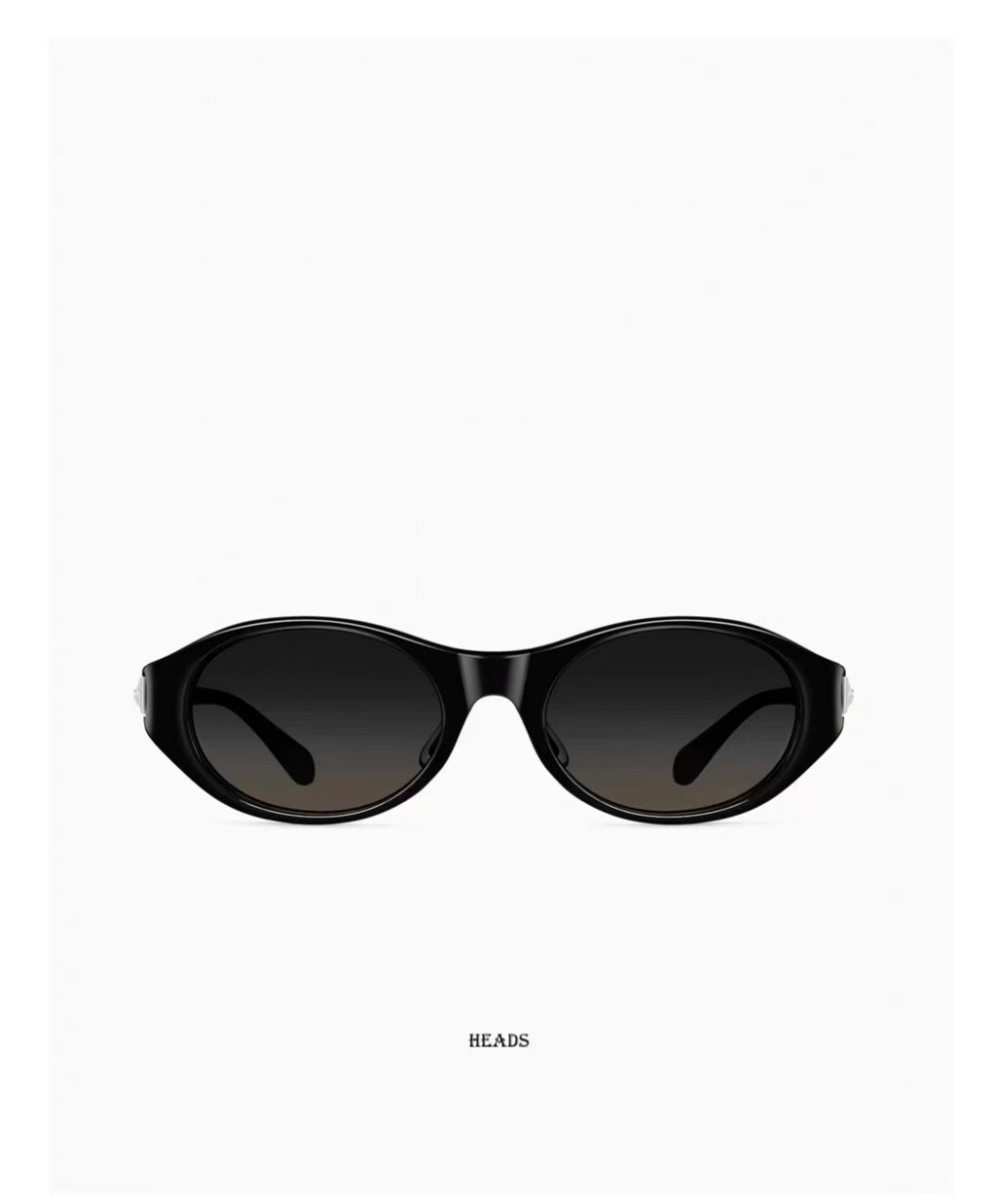 Women’s Glossy Black full-rim cat-eye sunglasses, front and three-quarter views