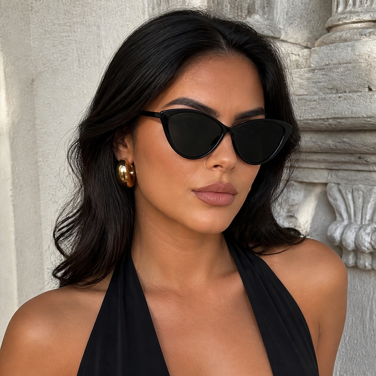 Women’s Black full-rim cat-eye sunglasses, front adult model fit