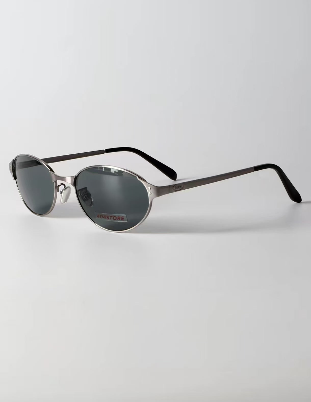 Women’s Gray full-rim slim oval sunglasses, three-quarter view