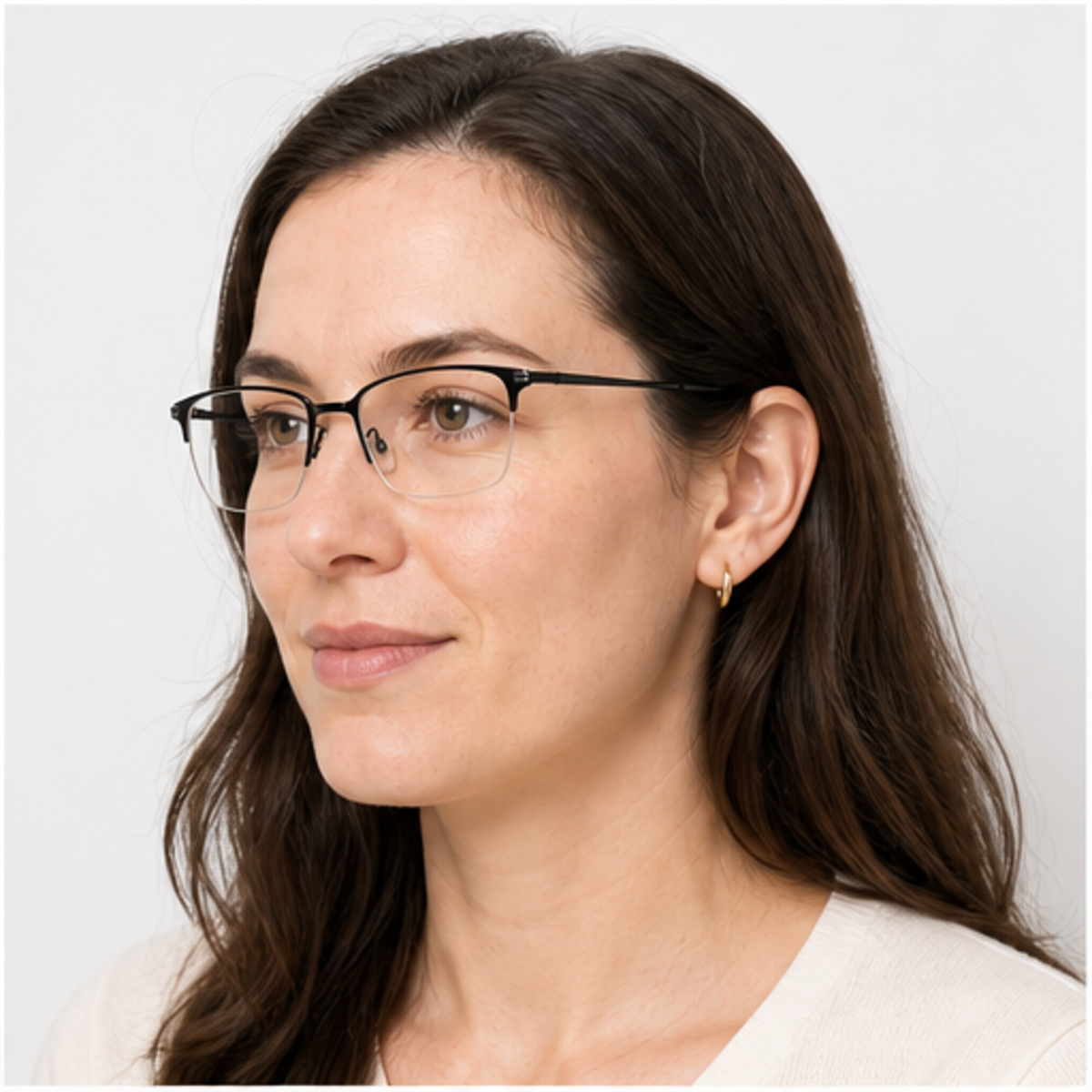 Black vintage classic pure-titanium semi-rimless glasses worn by an adult White Woman