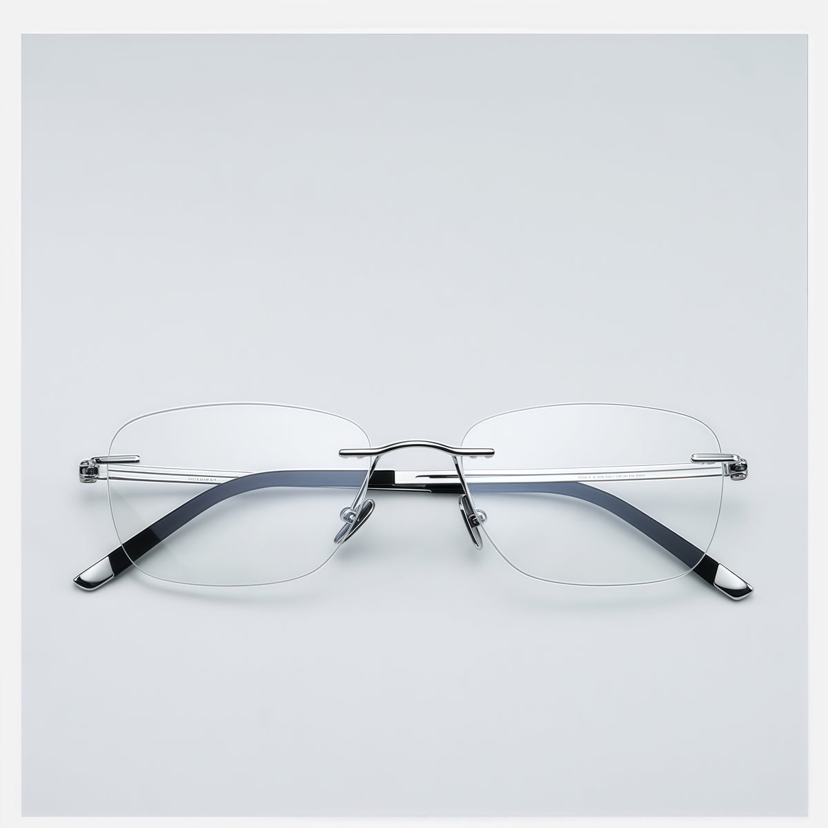 Silver men's pure titanium rimless rectangular glasses, front product view
