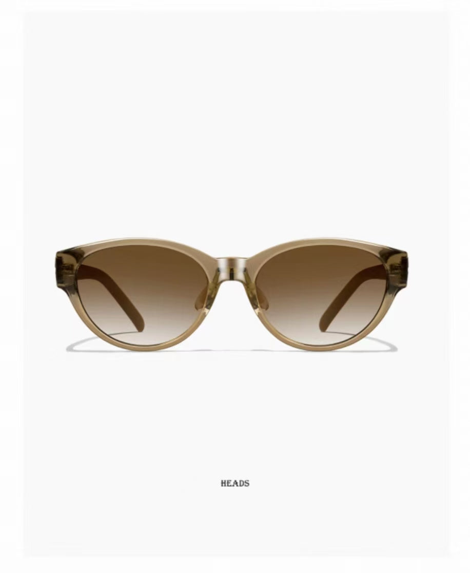 Women’s Brown full-rim cat-eye sunglasses, front and three-quarter views