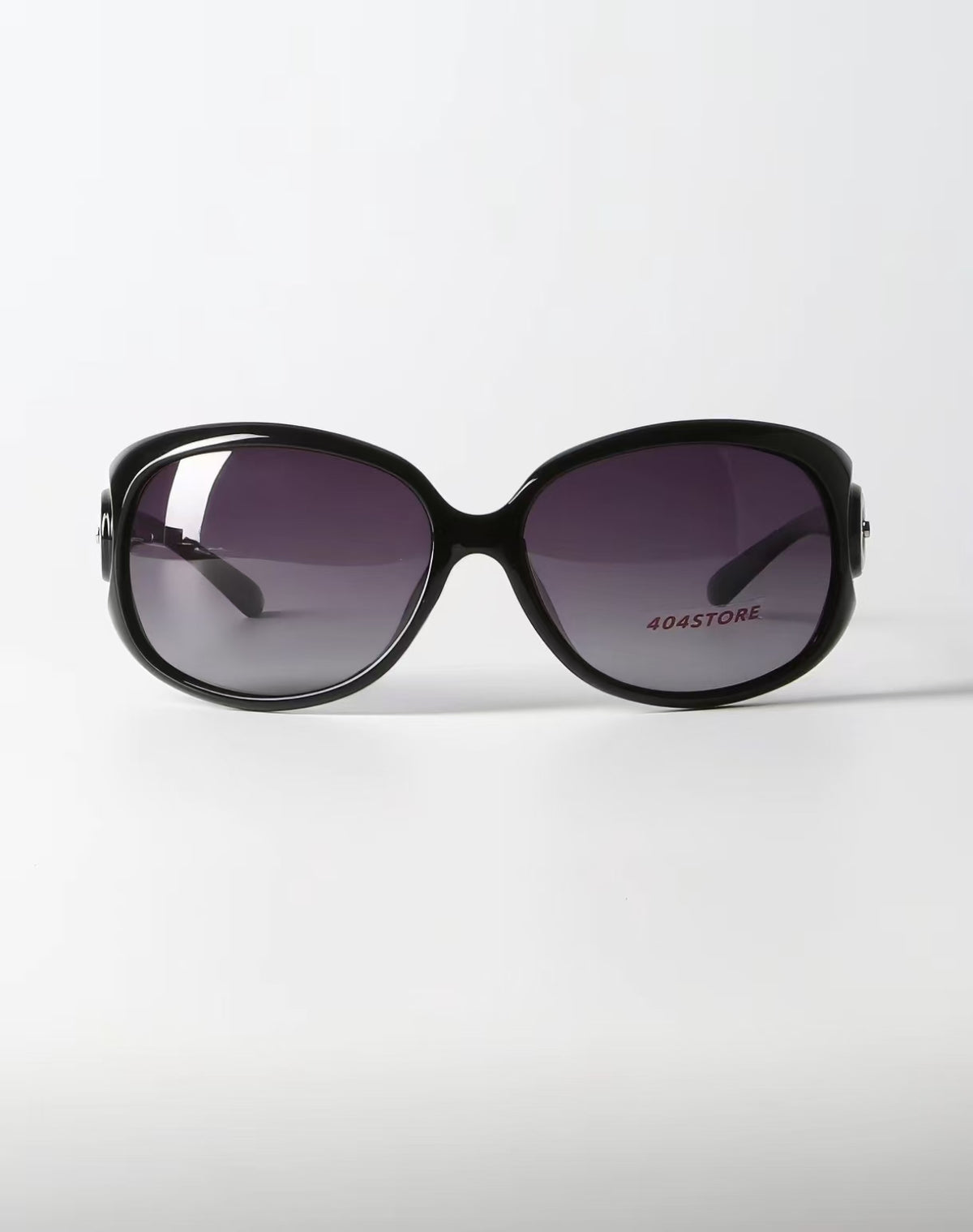 Women’s Black full-rim oversized oval sunglasses, front view