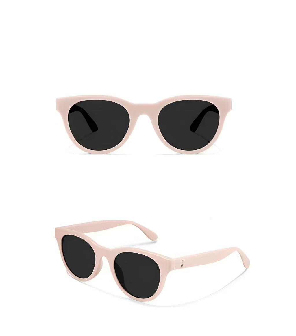 Women’s Dusty Pink full-rim oversized cat-eye sunglasses, front and three-quarter views