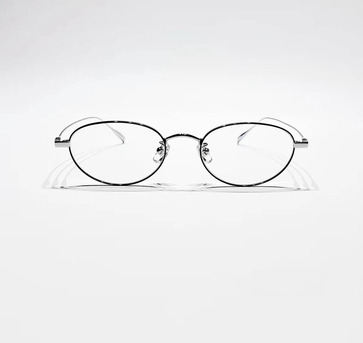 Black & Silver women's titanium small oval full-rim glasses, front product view