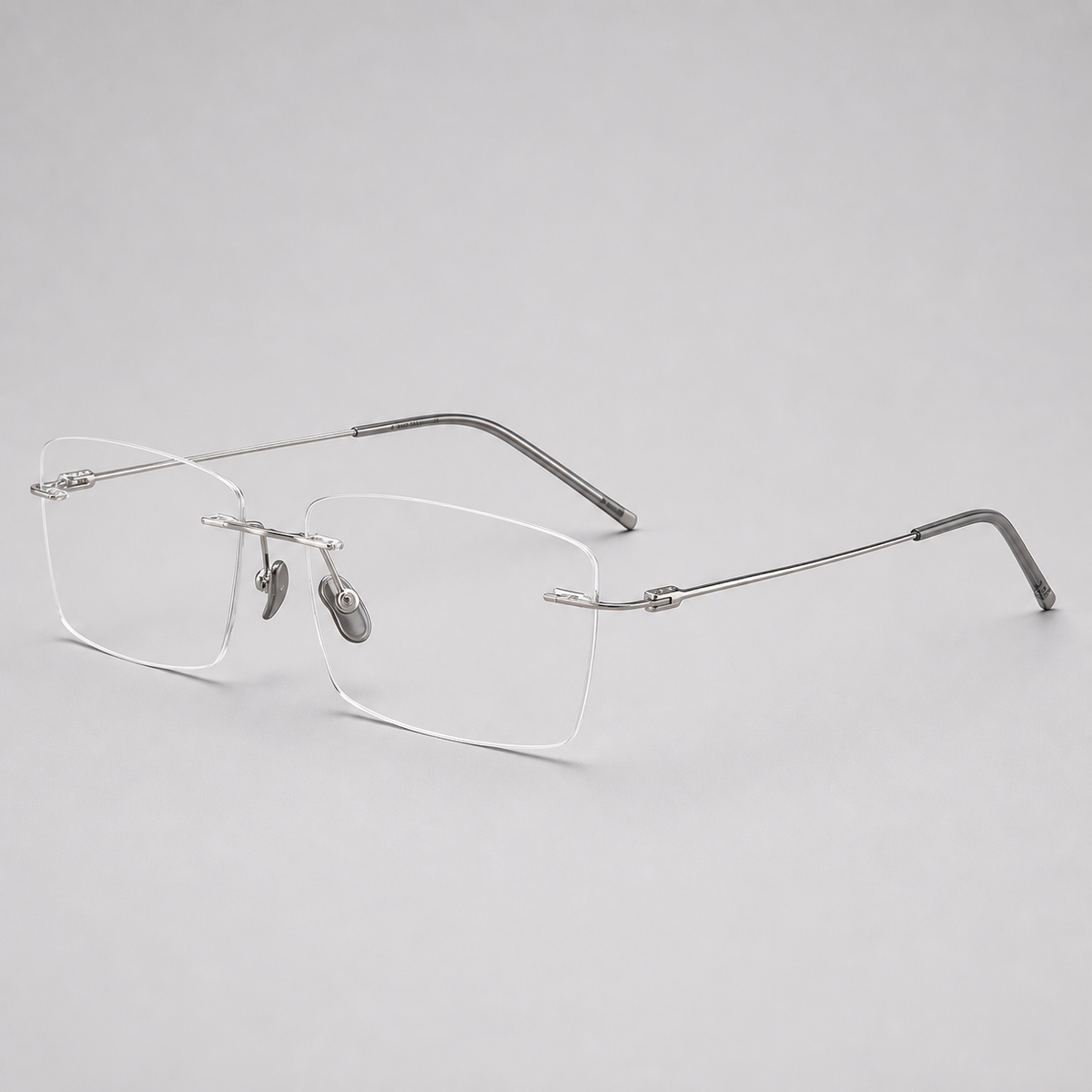 Silver pure titanium rimless shallow rectangular eyeglasses, 45-degree product view