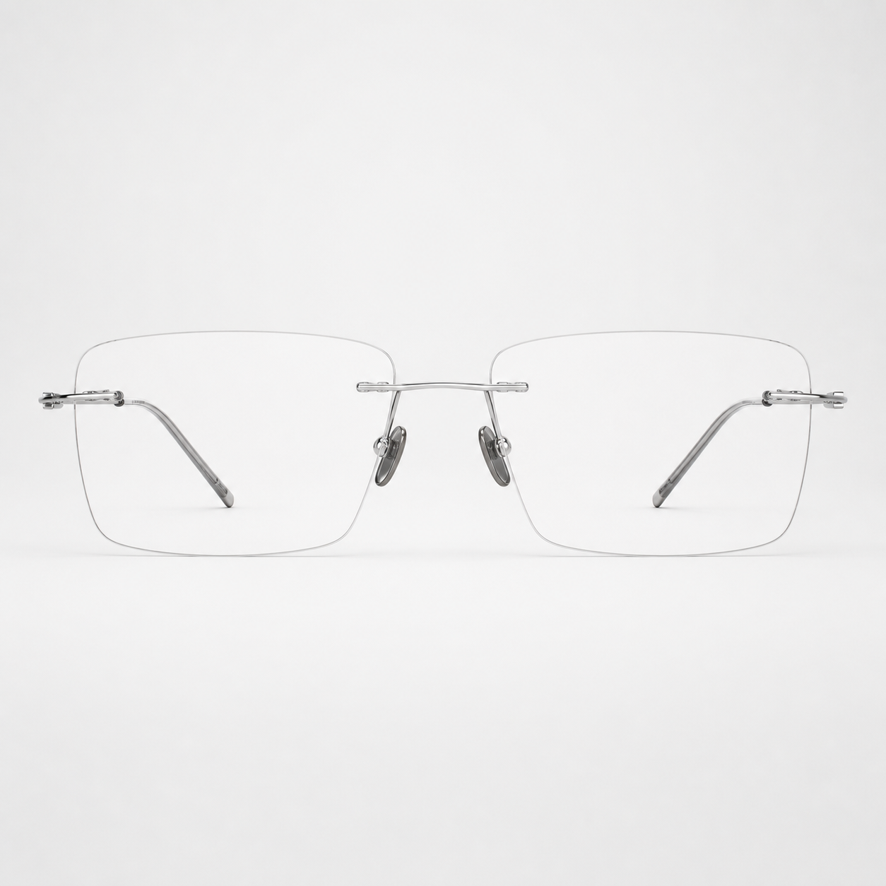 Silver pure titanium rimless shallow rectangular eyeglasses, straight-on product view