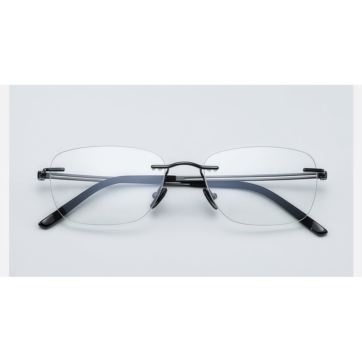 Gunmetal men's pure titanium rimless rectangular glasses, front product view