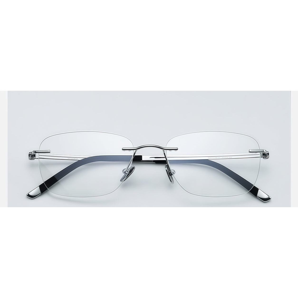 Silver men's pure titanium rimless rectangular glasses, front product view