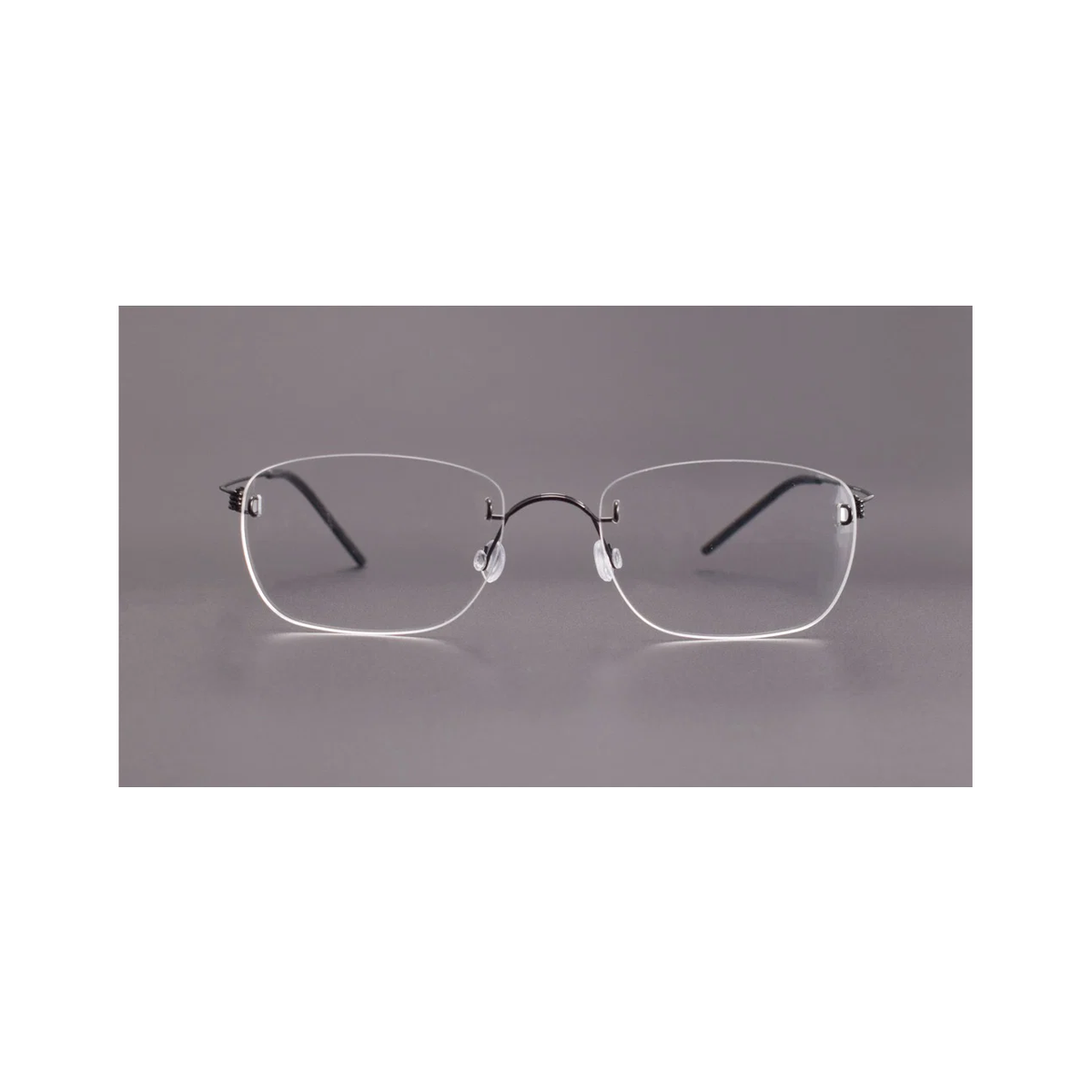 Black men's titanium rimless spring-hinge glasses, front product view