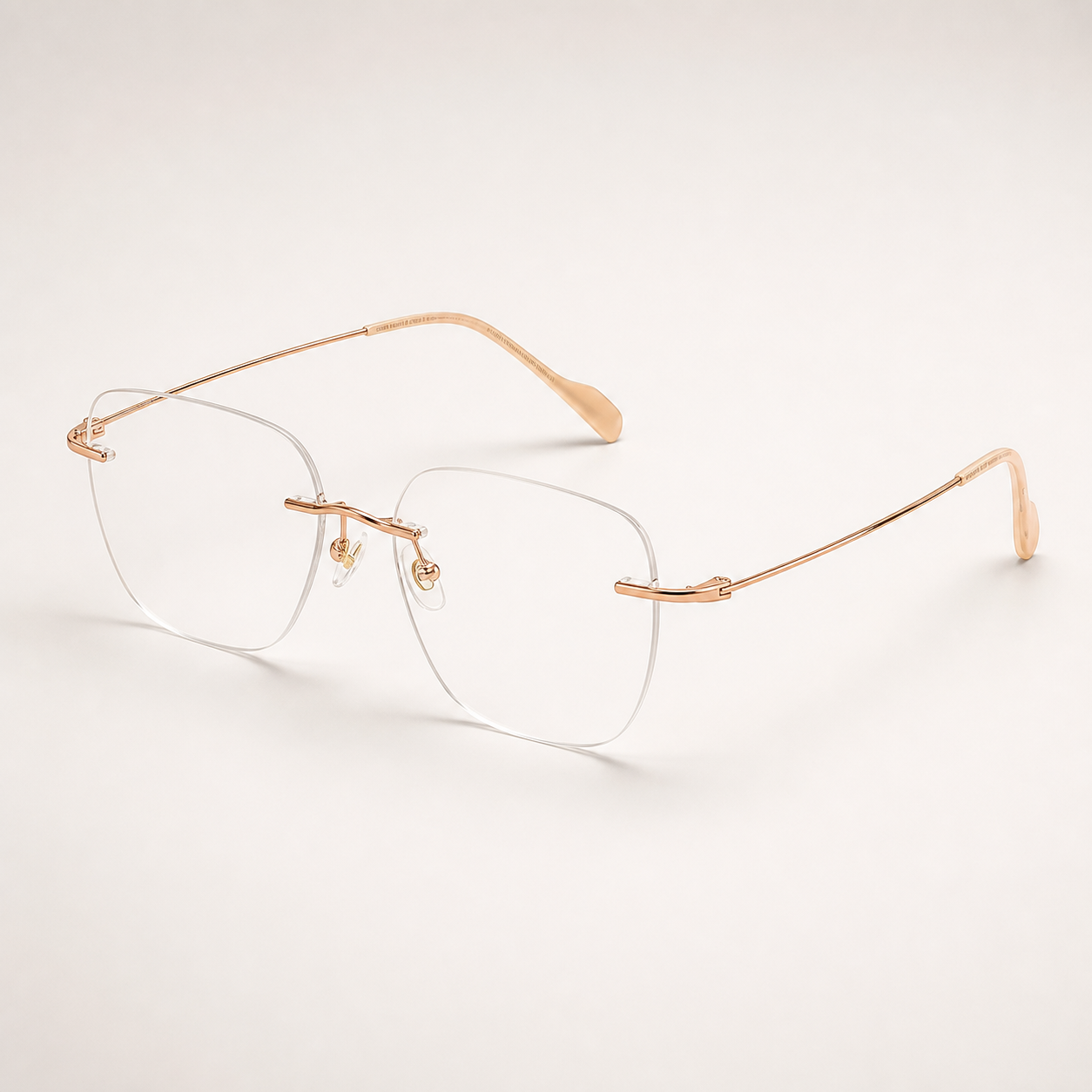 Rose Gold pure titanium rimless soft-square eyeglasses, 45-degree product view