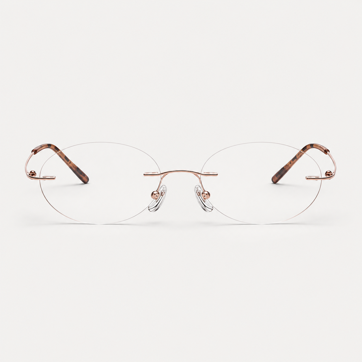 Rose Gold/Tortoise women's titanium rimless oval glasses, front product view