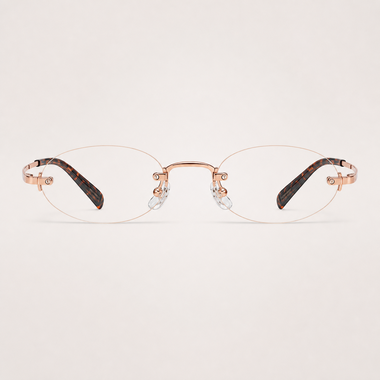 Rose Gold/Leopard women's titanium rimless narrow oval glasses, front product view