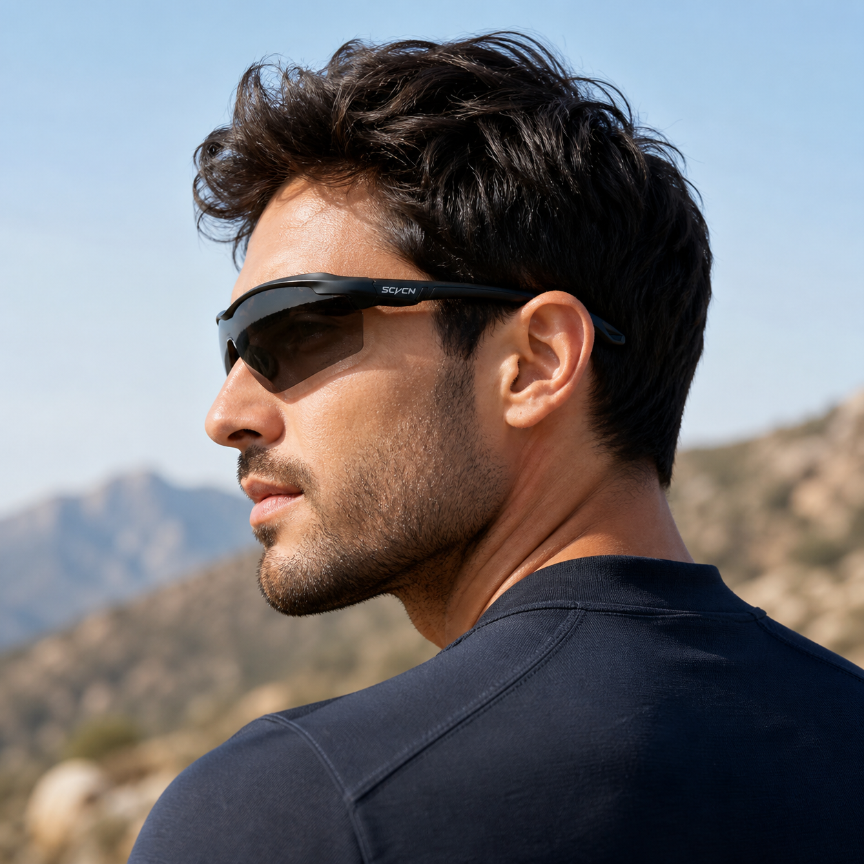 Adult model wearing Black Frame/Photochromic Black Lens Day & Night Outdoor Sports Sunglasses, lifestyle view 2