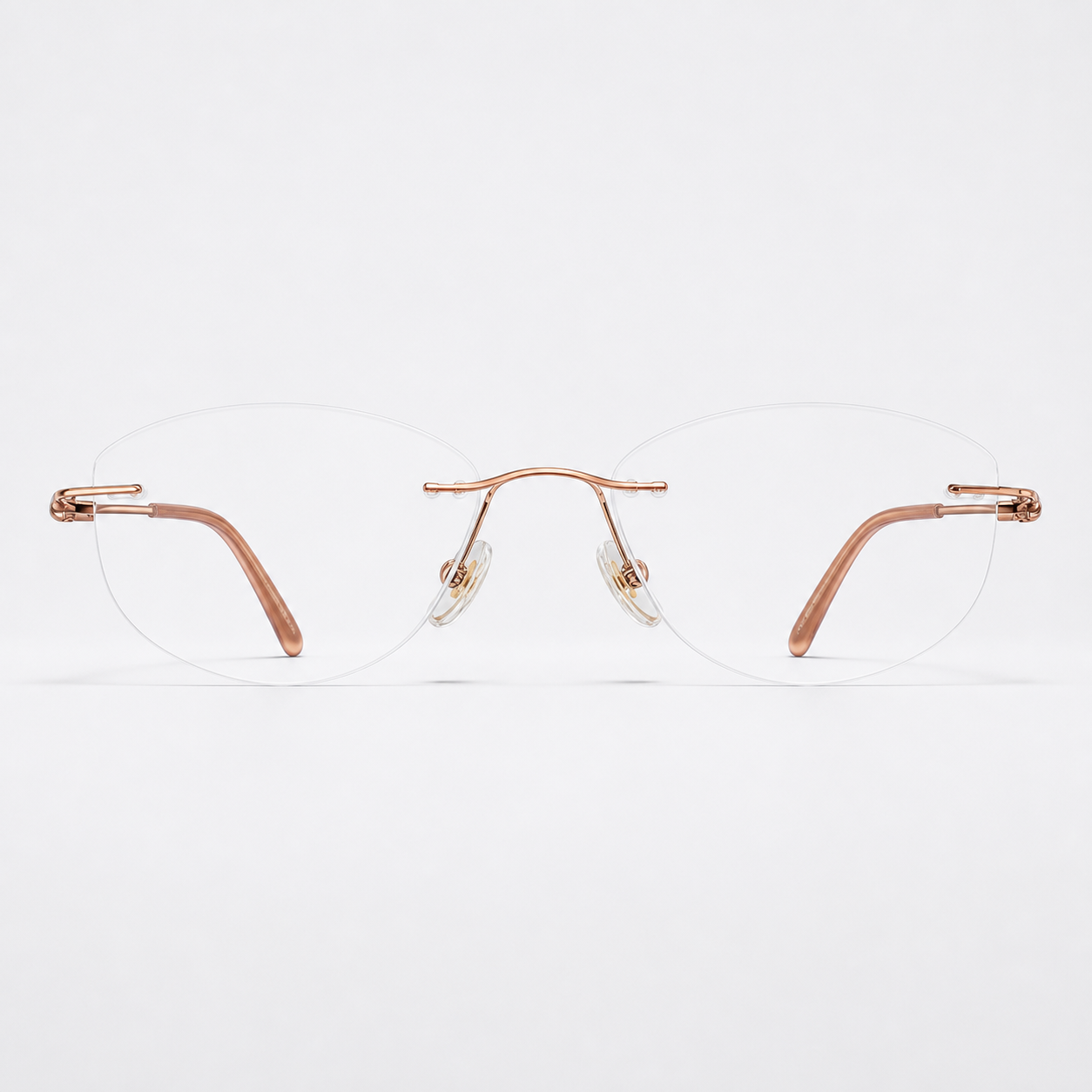 Rose Gold women's titanium alloy rimless soft butterfly glasses, front product view