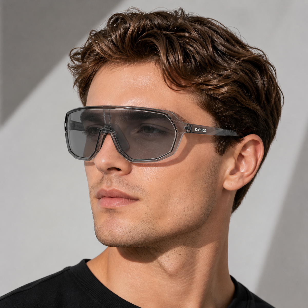 Crystal Grey Frame/Photochromic Grey Lens eyewear, worn by an adult model, alternate fit