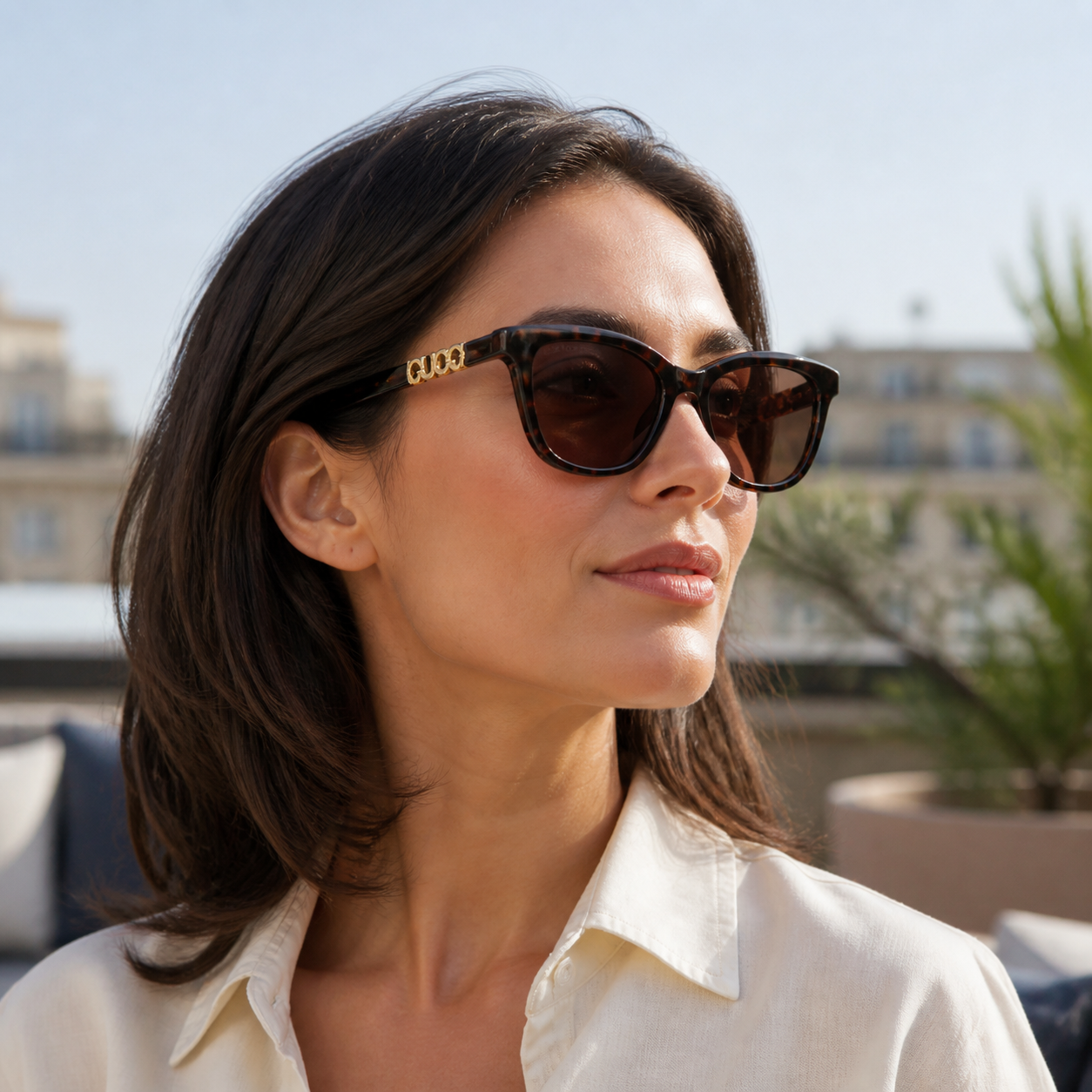 Adult model wearing Brown Gucci Luxury Women’s Brown Geometric Sunglasses, lifestyle view 2