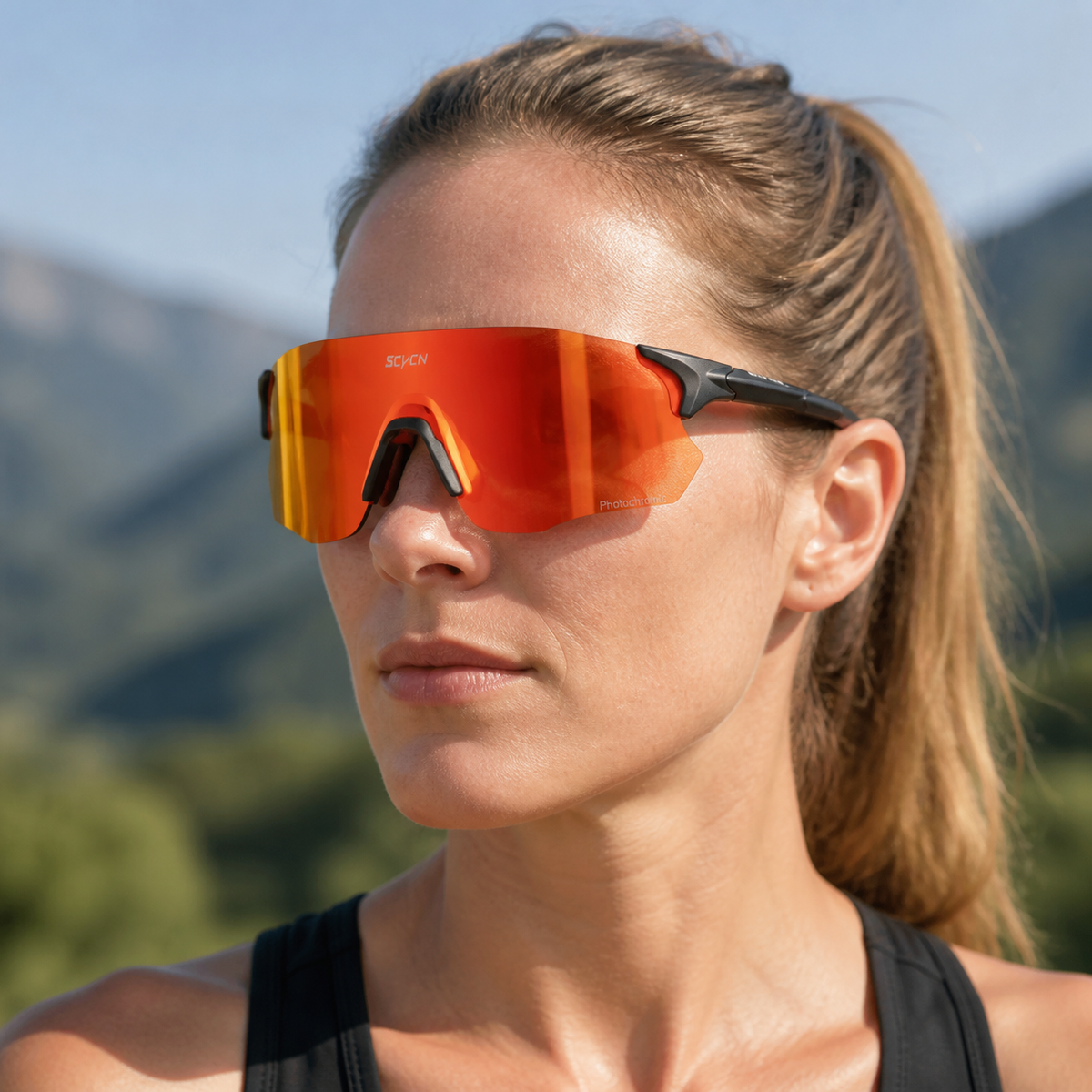 Matte Black Frame/Photochromic Red Lens eyewear, worn by an adult model, alternate fit