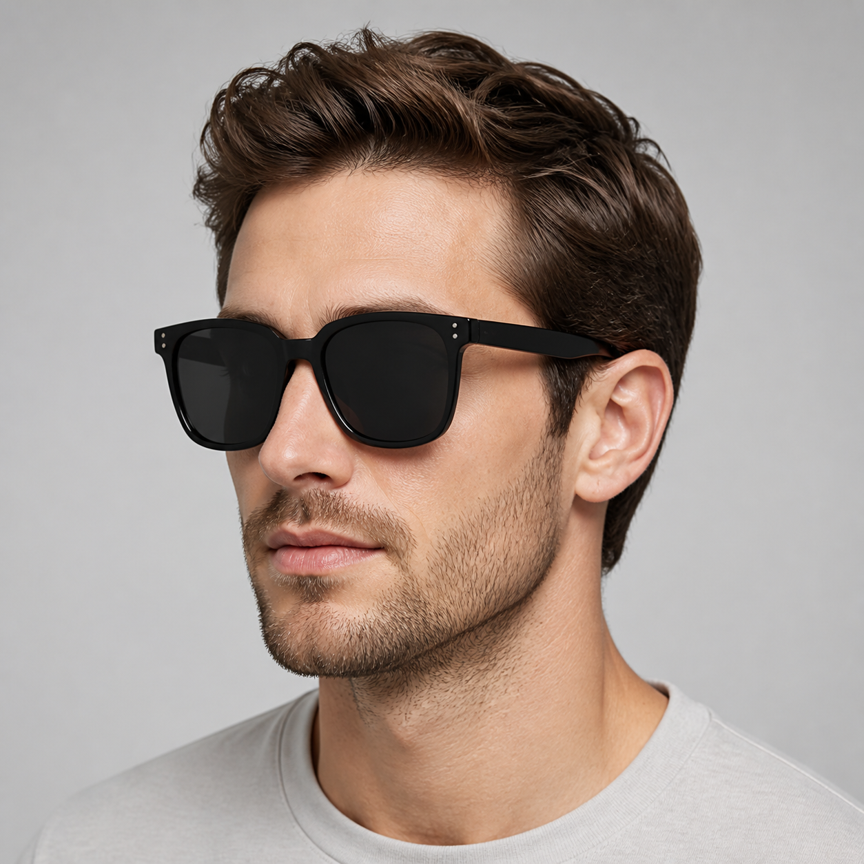 Men’s Black sunglasses worn by an adult White man