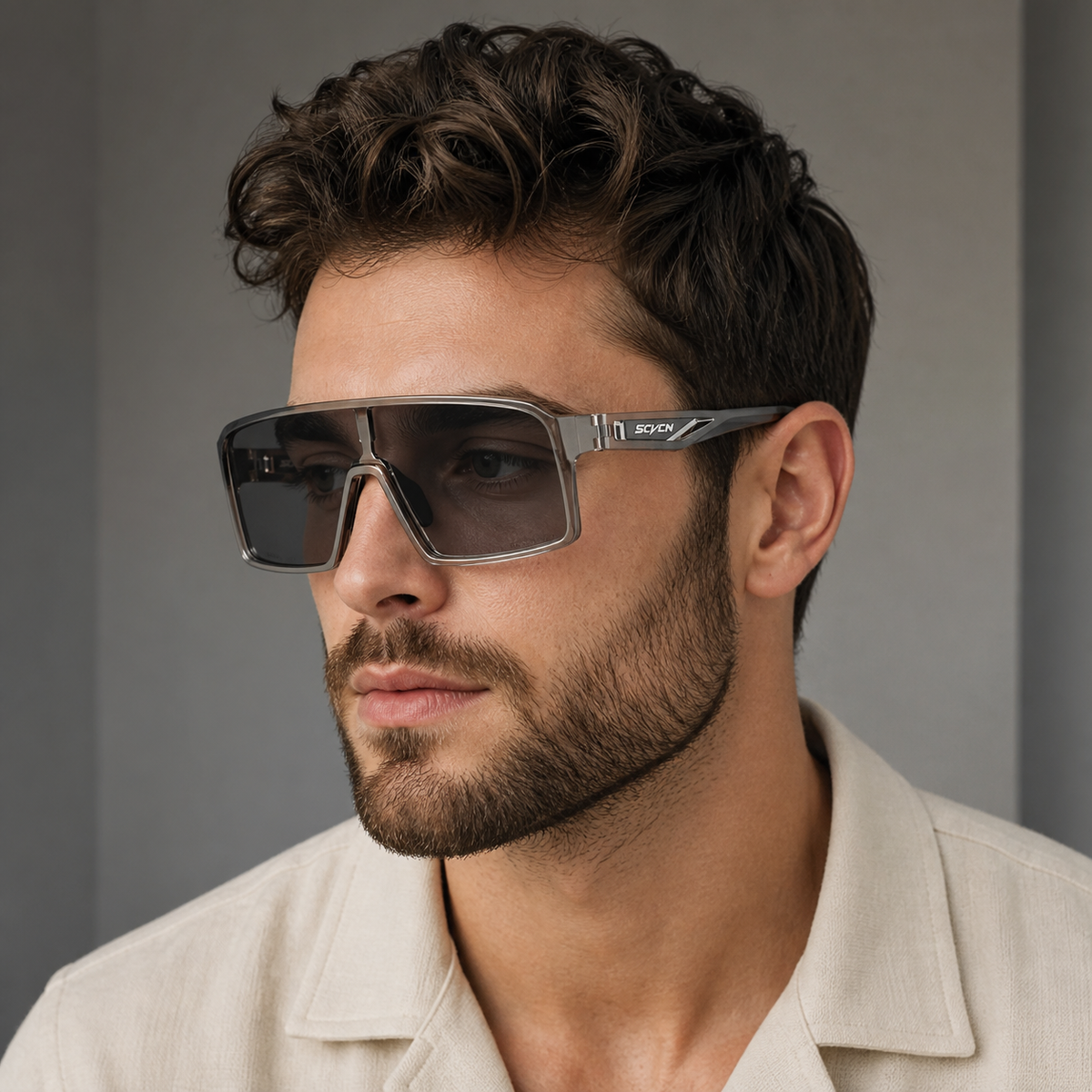 Crystal Grey Frame/Photochromic Grey Lens eyewear, worn by an adult model, alternate fit
