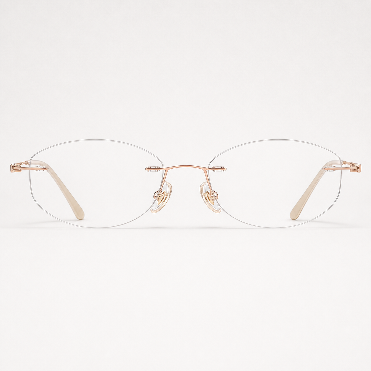 Rose Gold women's pure titanium rimless soft rectangular glasses, front product view
