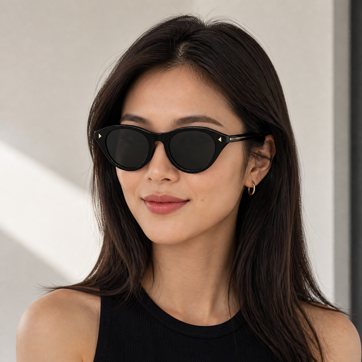 Black Prada Women's Acetate Cat-Eye Sunglasses, worn by an adult model, front fit