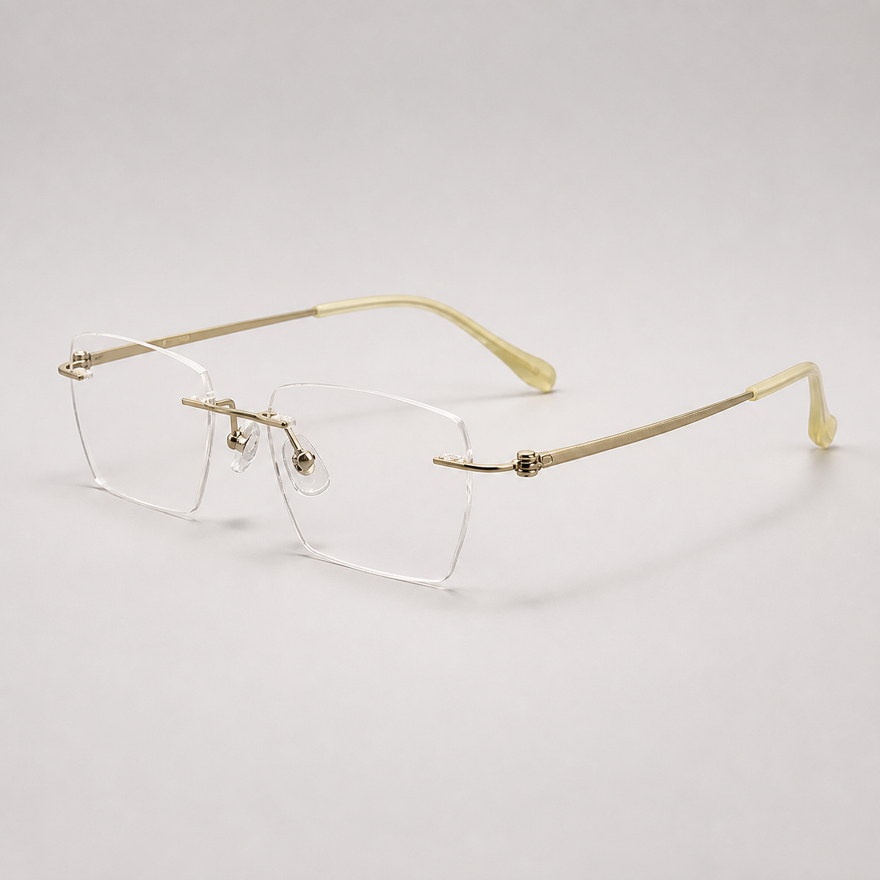 Gold men's pure titanium and lightweight acetate rimless geometric glasses, 45-degree product view