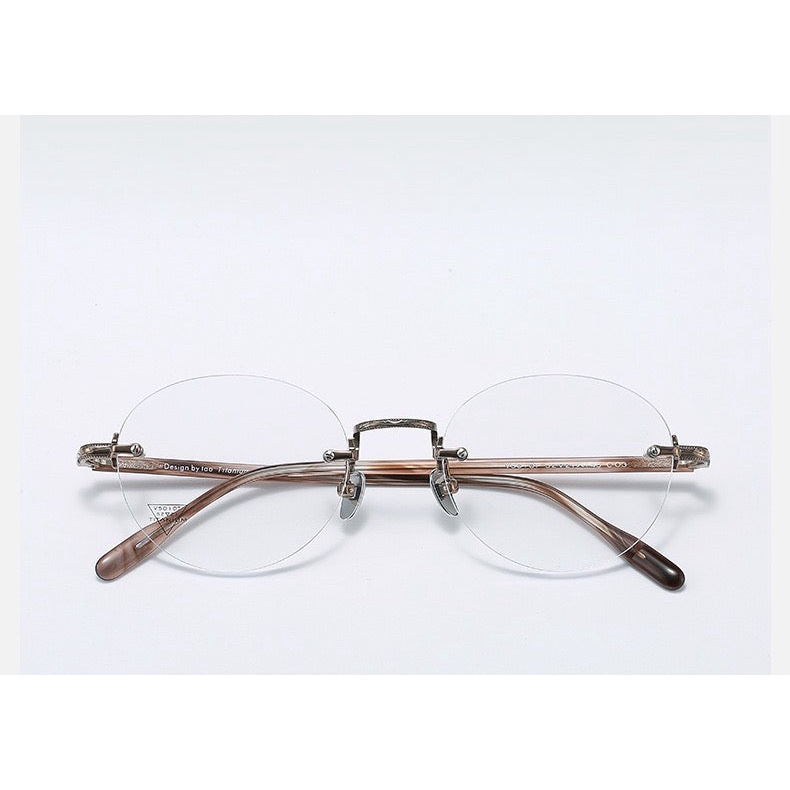 Antique Bronze/Purple Brown Women's Titanium-Acetate Rimless Rounded Glasses, clean front product view
