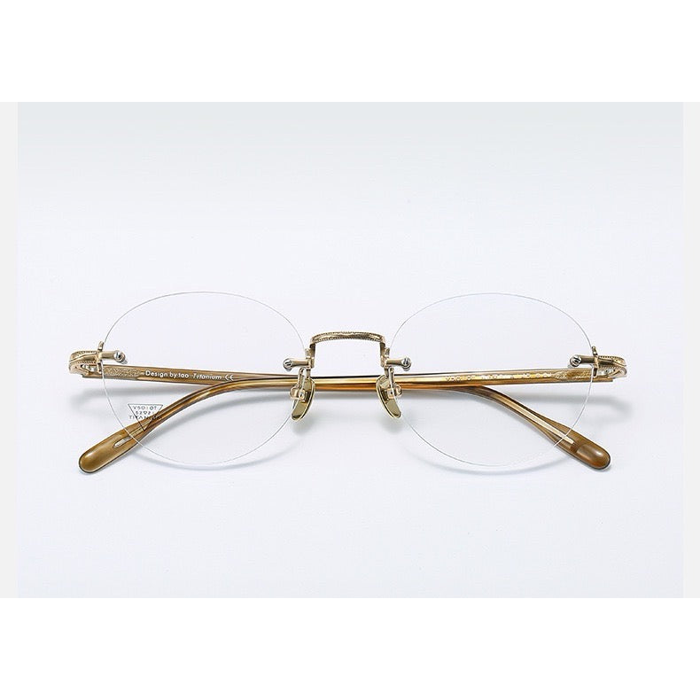 Light Gold/Amber Brown Women's Titanium-Acetate Rimless Rounded Glasses, clean front product view