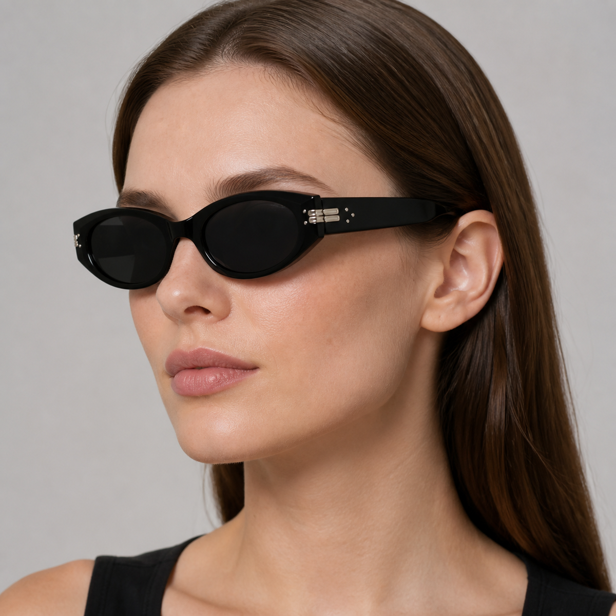 Women’s Black sunglasses worn by an adult White woman
