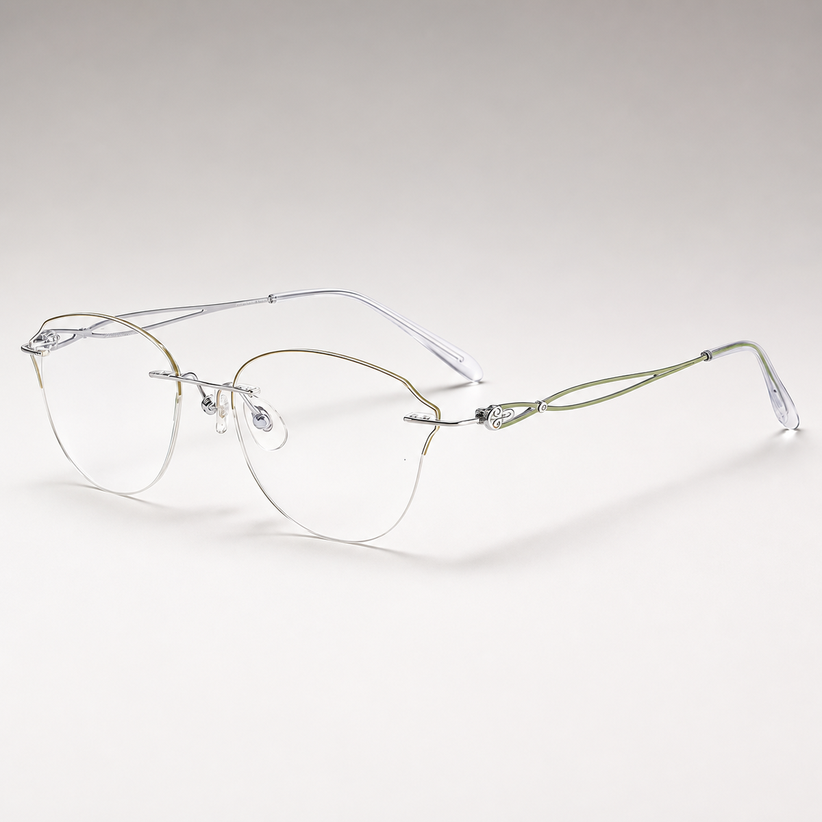 Silver/Green titanium rimless butterfly eyeglasses, 45-degree product view