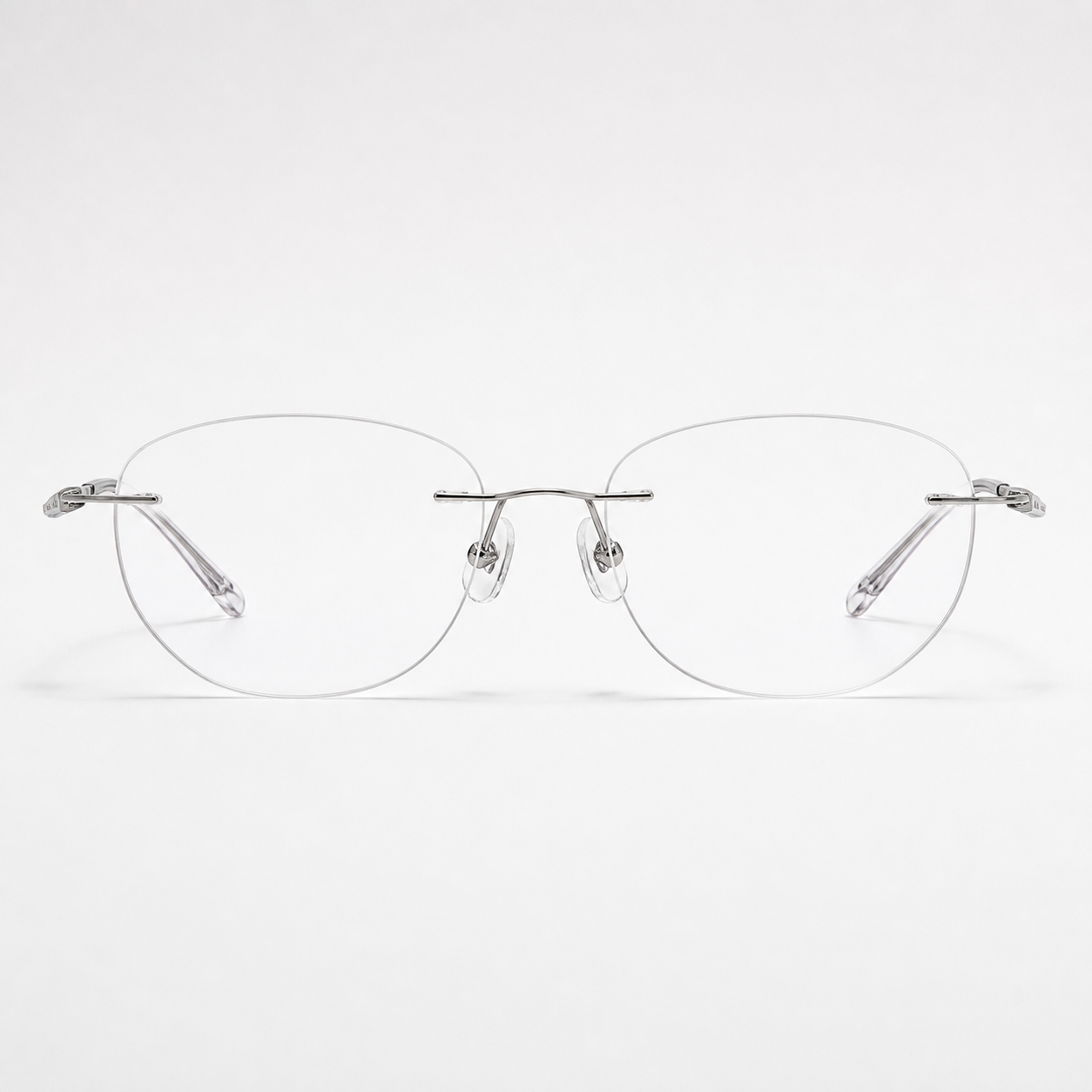 Silver titanium rimless round eyeglasses, straight-on product view