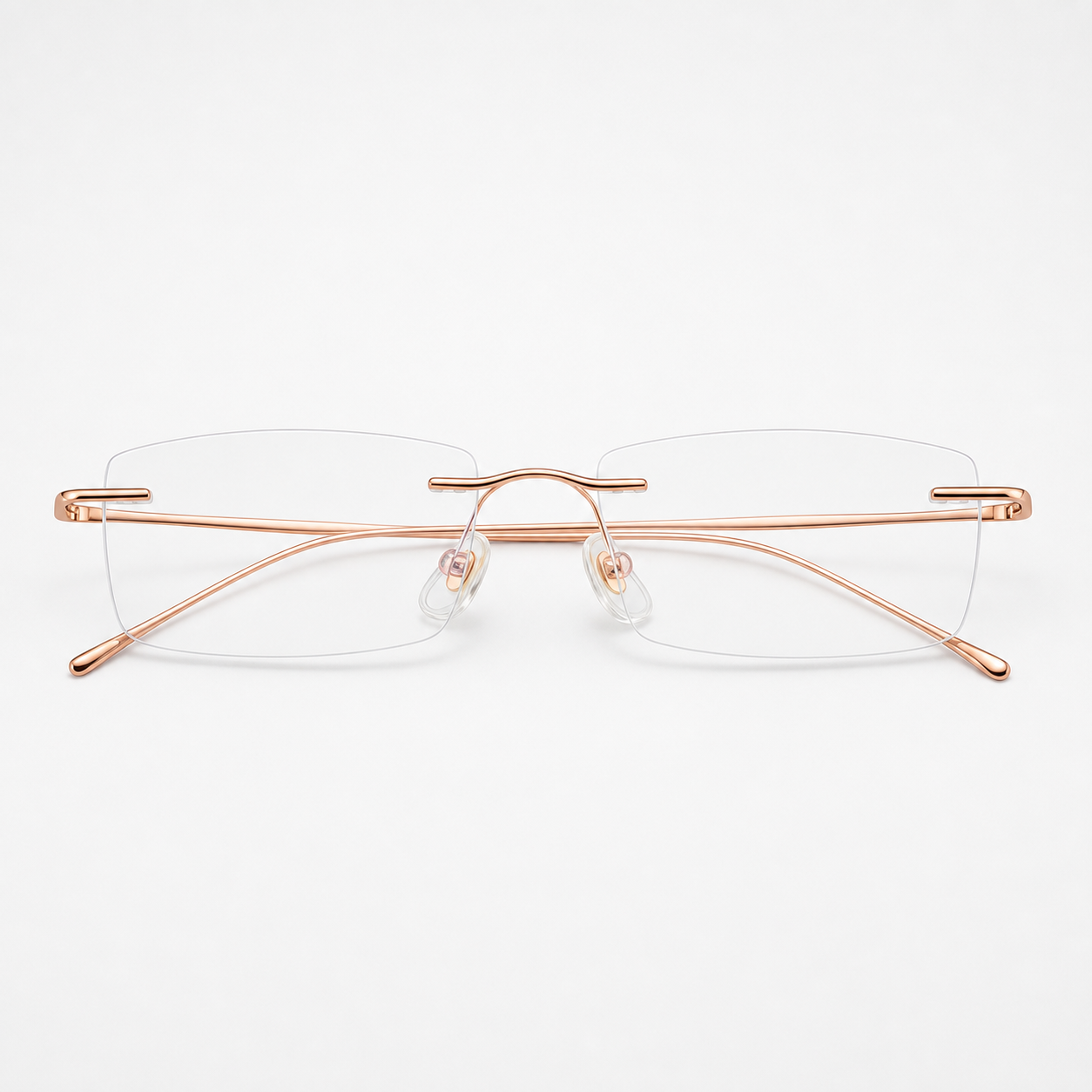 Rose Gold beta-titanium rectangular rimless glasses, front product view