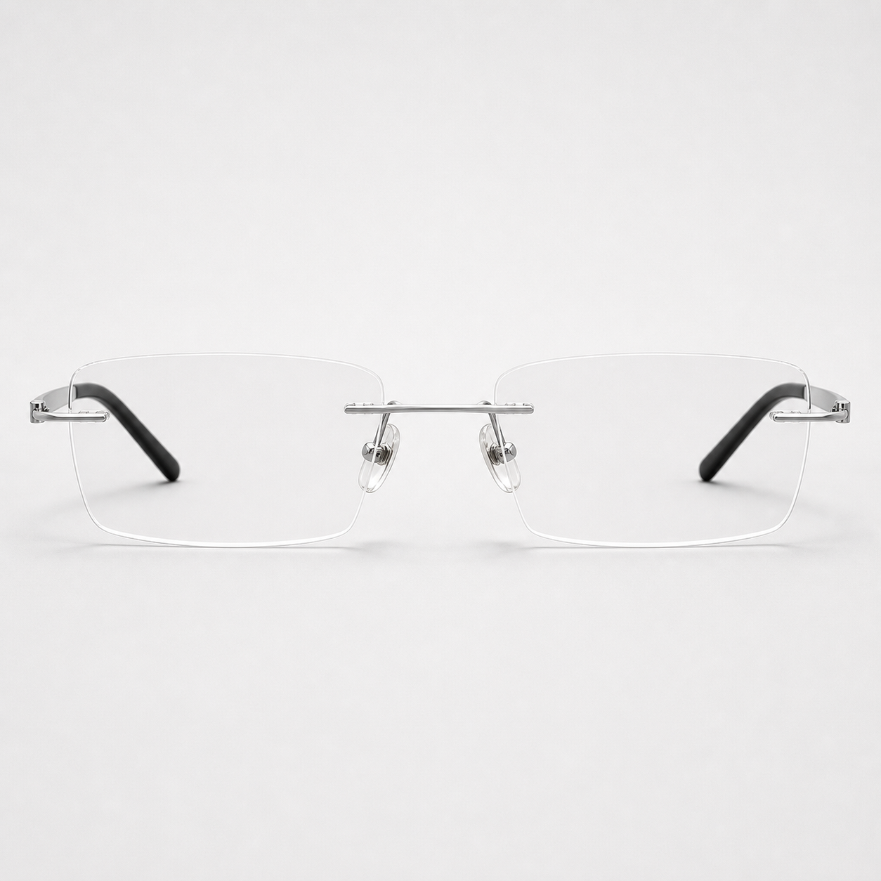 Silver titanium and acetate rectangular rimless glasses, front product view