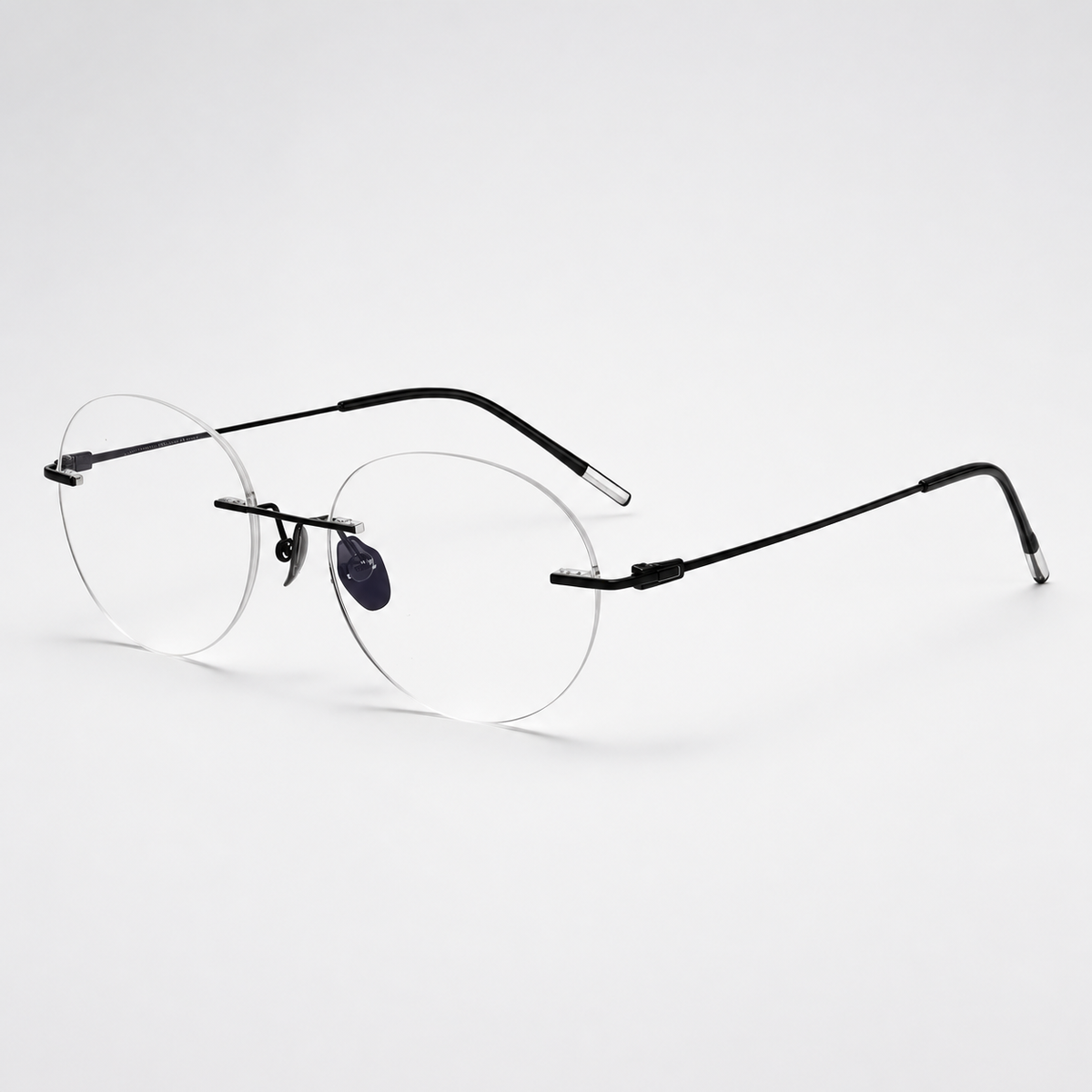 Black titanium rimless oval eyeglasses, 45-degree product view
