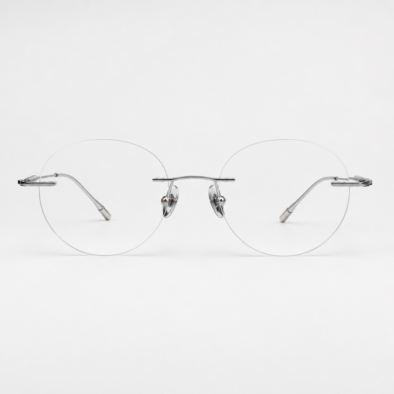 Black/Silver titanium rimless oval eyeglasses, straight-on product view