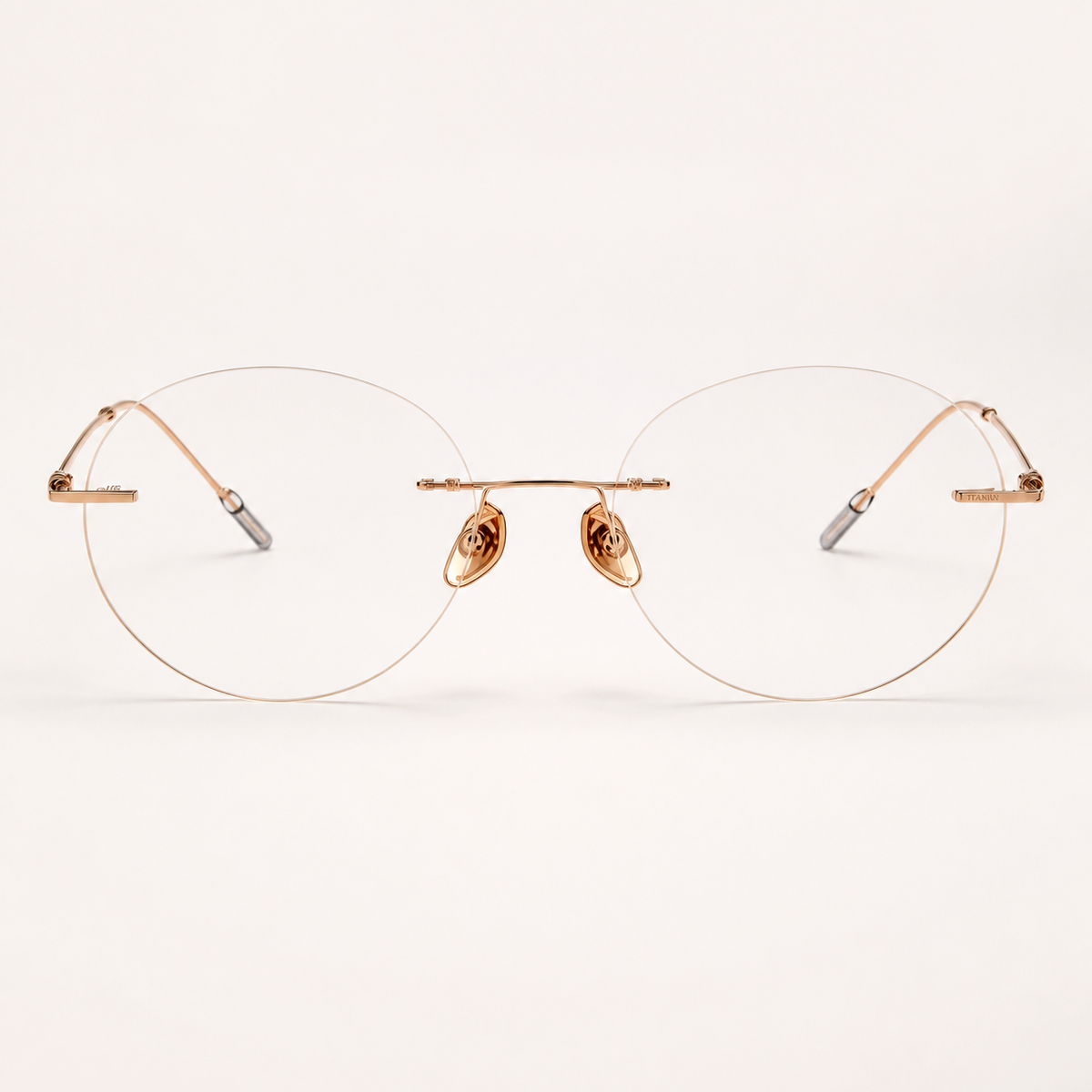 Rose Gold titanium rimless oval eyeglasses, straight-on product view