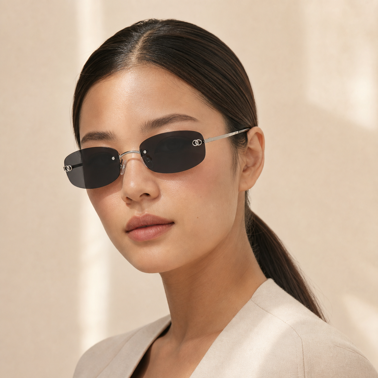 Black Women's Rimless Alloy Y2K Sunglasses, angled adult model view